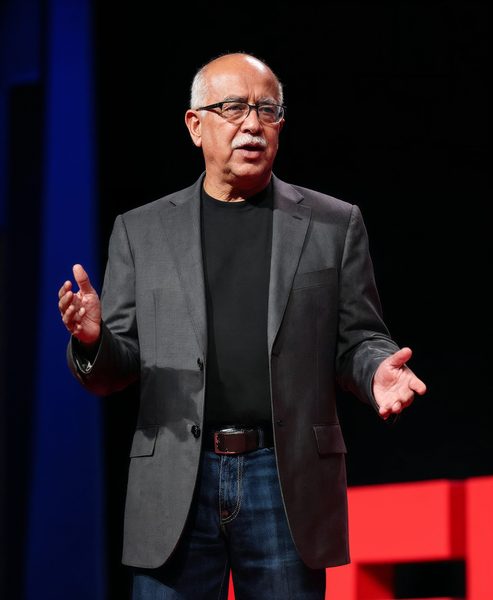Dr. Ravi R. Iyer — speaking on the TEDx stage