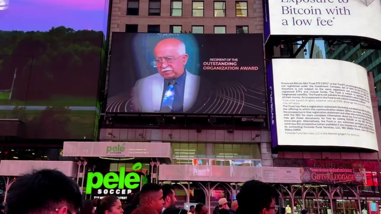 ActivPower Chairman Dr. Ravi Iyer accepts the Outstanding Organization Award — Times Square broadcast